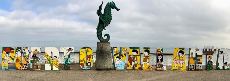 The Puerto Vallarta sign, in giant letters, surrounds the iconic 'Boy on the Seahorse' statue