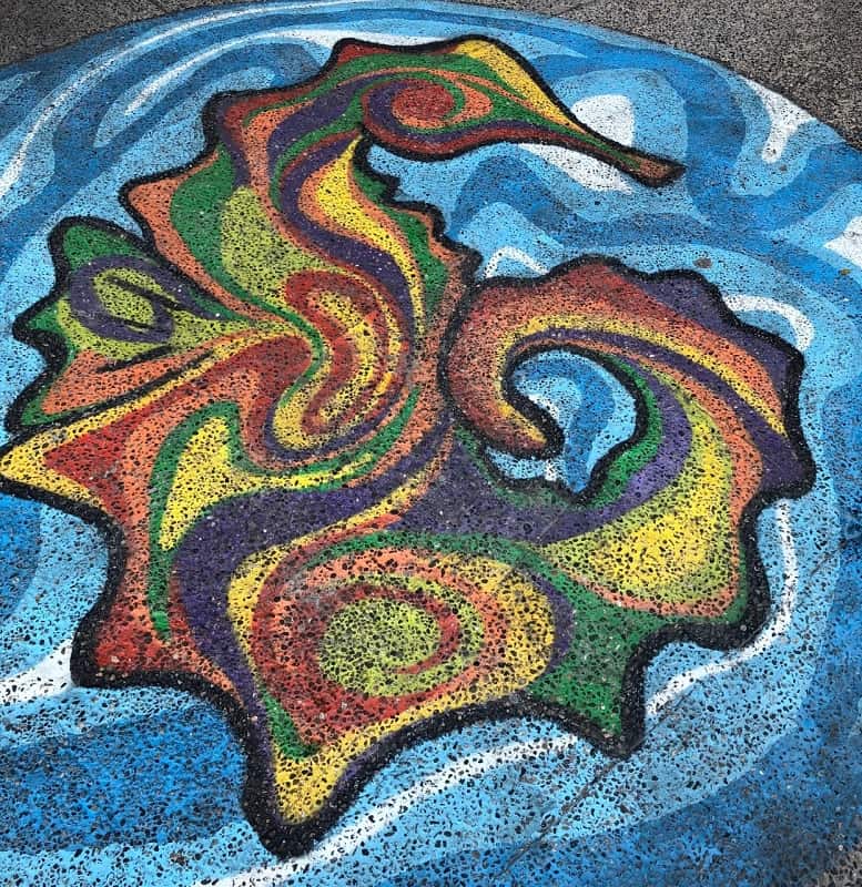 Vibrant mural of a seahorse decorates a sidewalk in Puerto Vallarta's Zona Romántica 