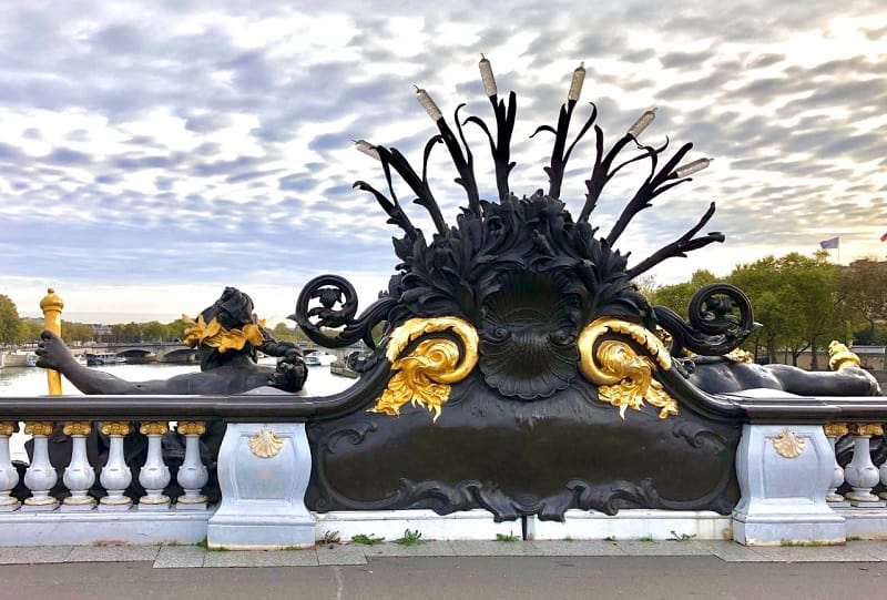 Elaborate statues decorate the Pont Alexandre III