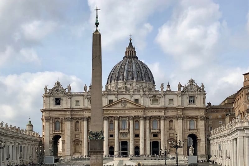 The iconic St. Peter's Basilica in Rome, as seen from Piazza San Pietro.