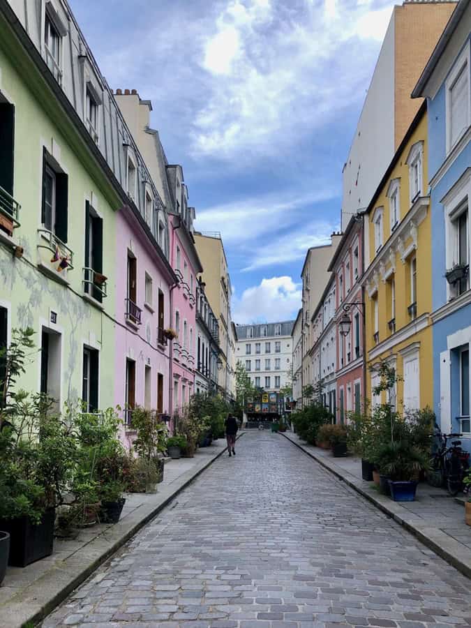 Pastel houses along Rue Cremieux in Paris France.