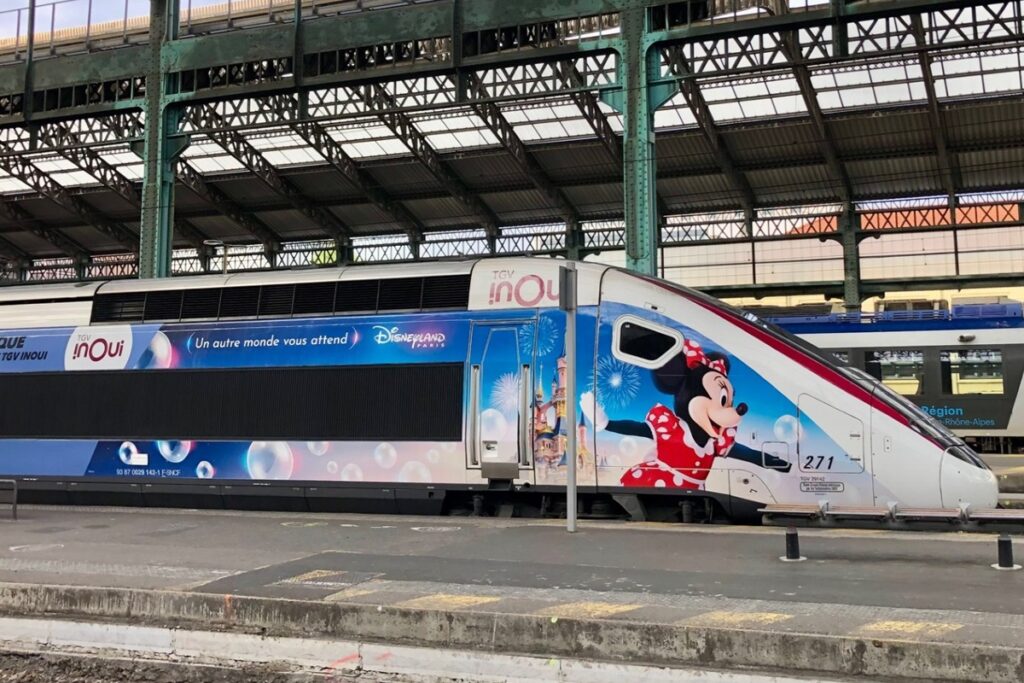 France TGV high speed train with image of Minnie Mouse on the front of the train.